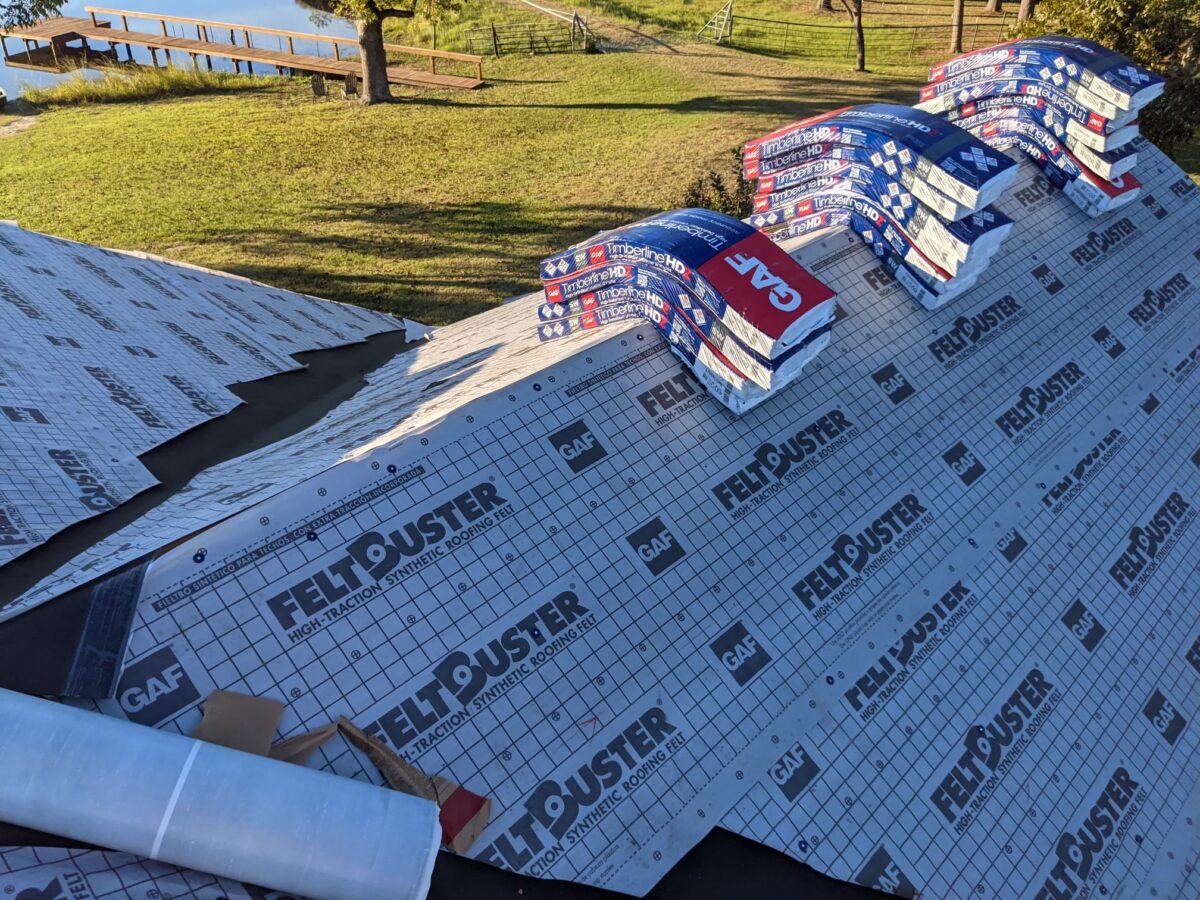 GAF roofing underlayment and shingle bundles during installation