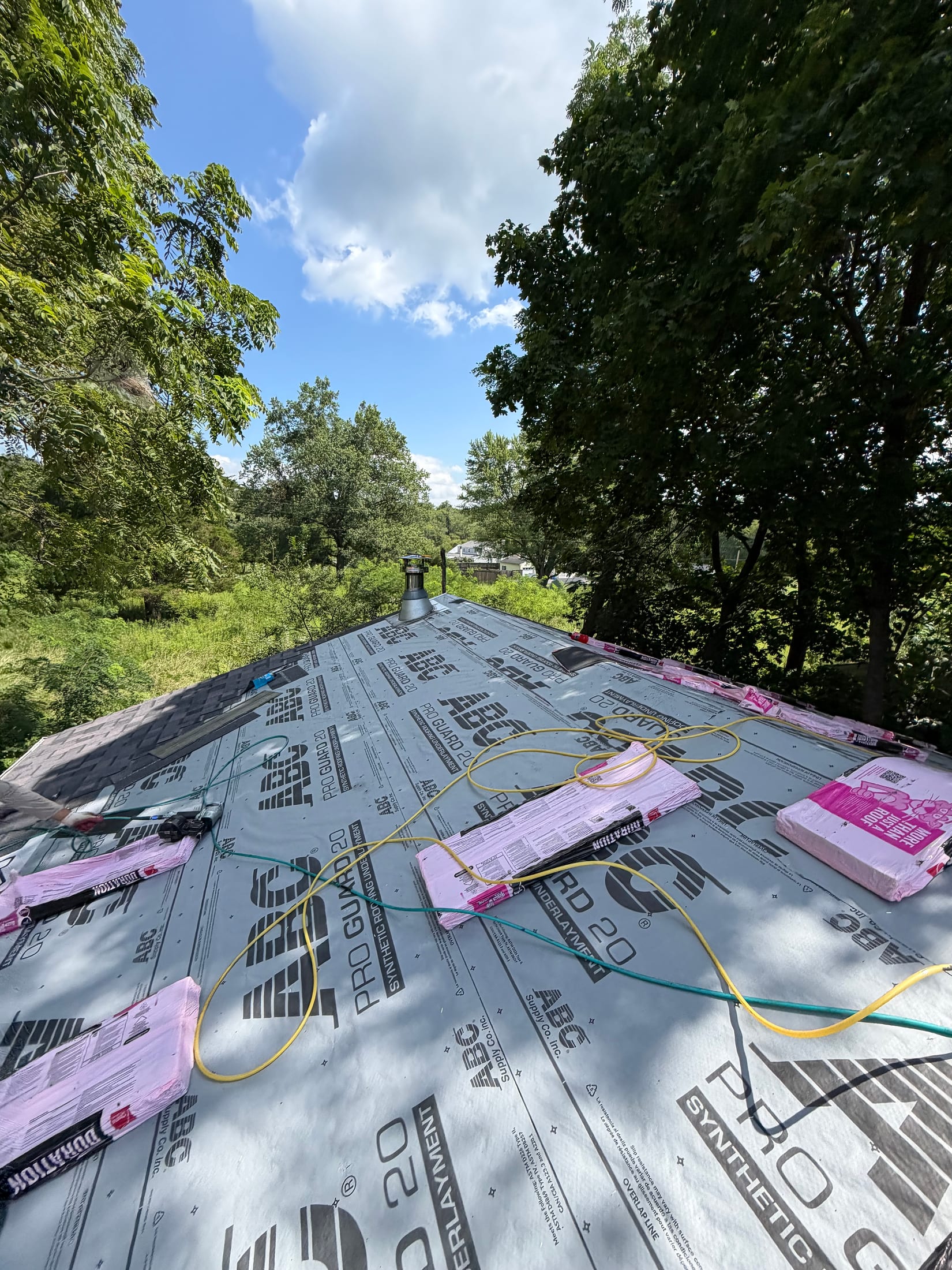 Synthetic roof underlayment installed before new shingles